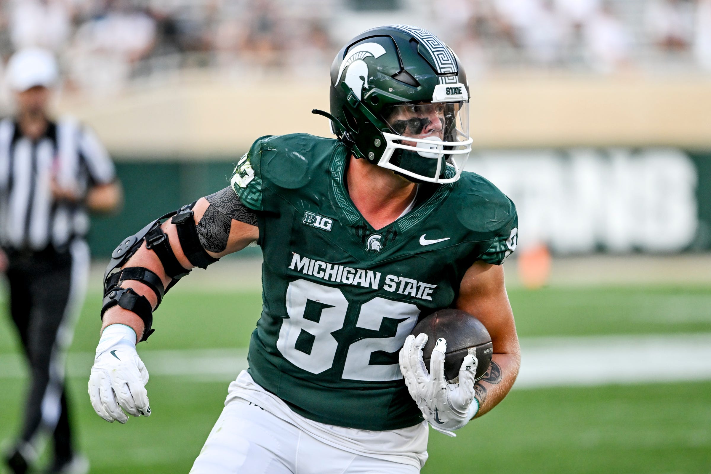 2024-09-15T025010Z_47550904_MT1USATODAY24235571_RTRMADP_3_MICHIGAN-STATE-S-BRENNAN-PARACHEK-RUNS-AFTER-A-CATCH-AGAINST.JPG