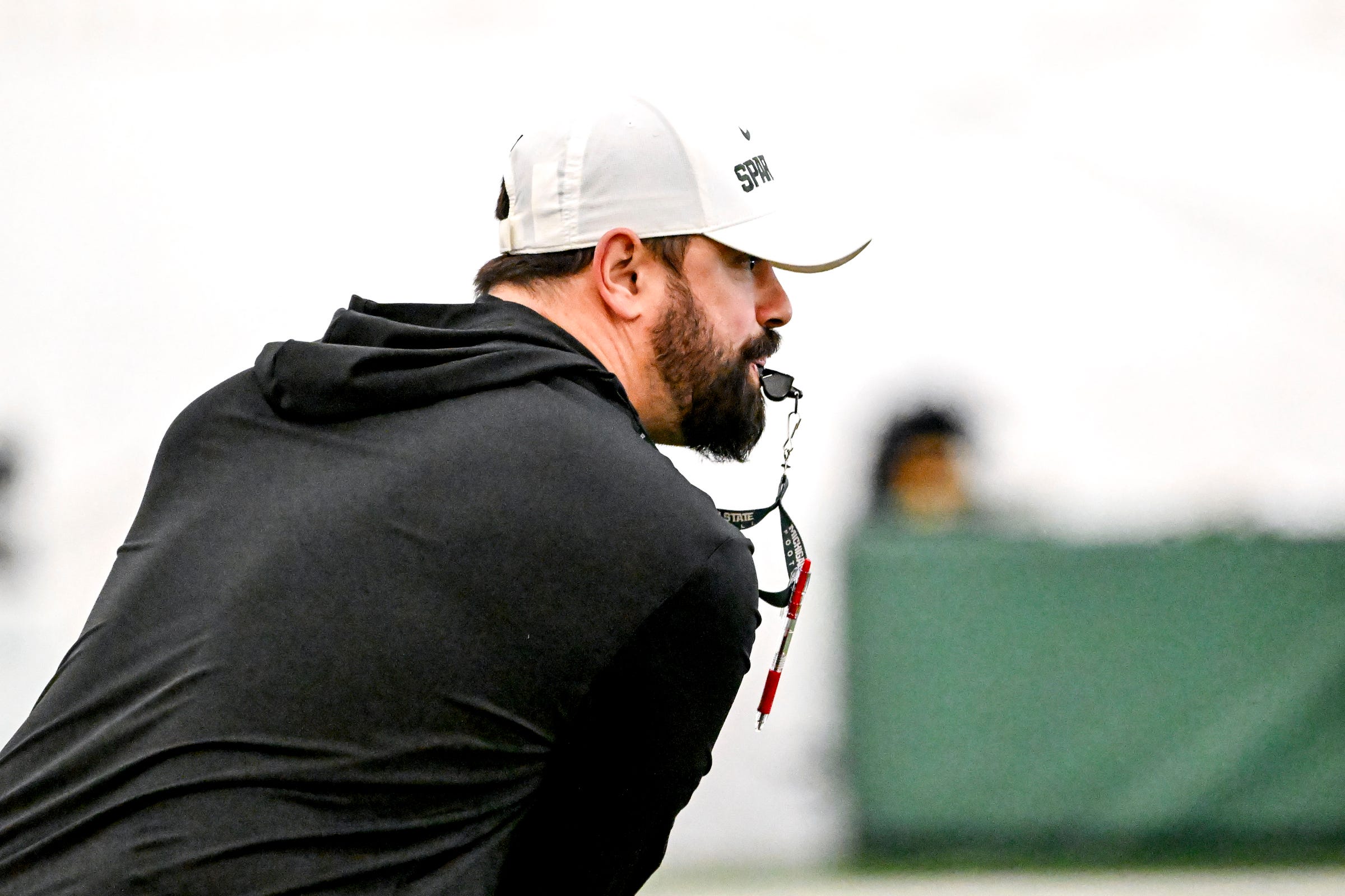 2025-04-08T161443Z_477787652_MT1USATODAY25876458_RTRMADP_3_MICHIGAN-STATE-TIGHT-ENDS-COACH-BRIAN-WOZNIAK-LOOKS-ON.JPG