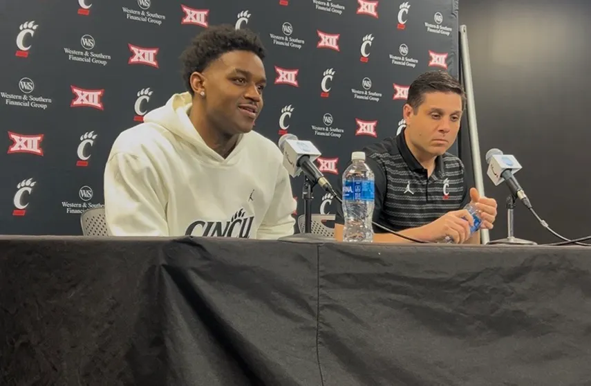 UC HC Wes Miller and G Jizzle James talk to the media ahead of West Virginia article image about Cincinnati Bearcats