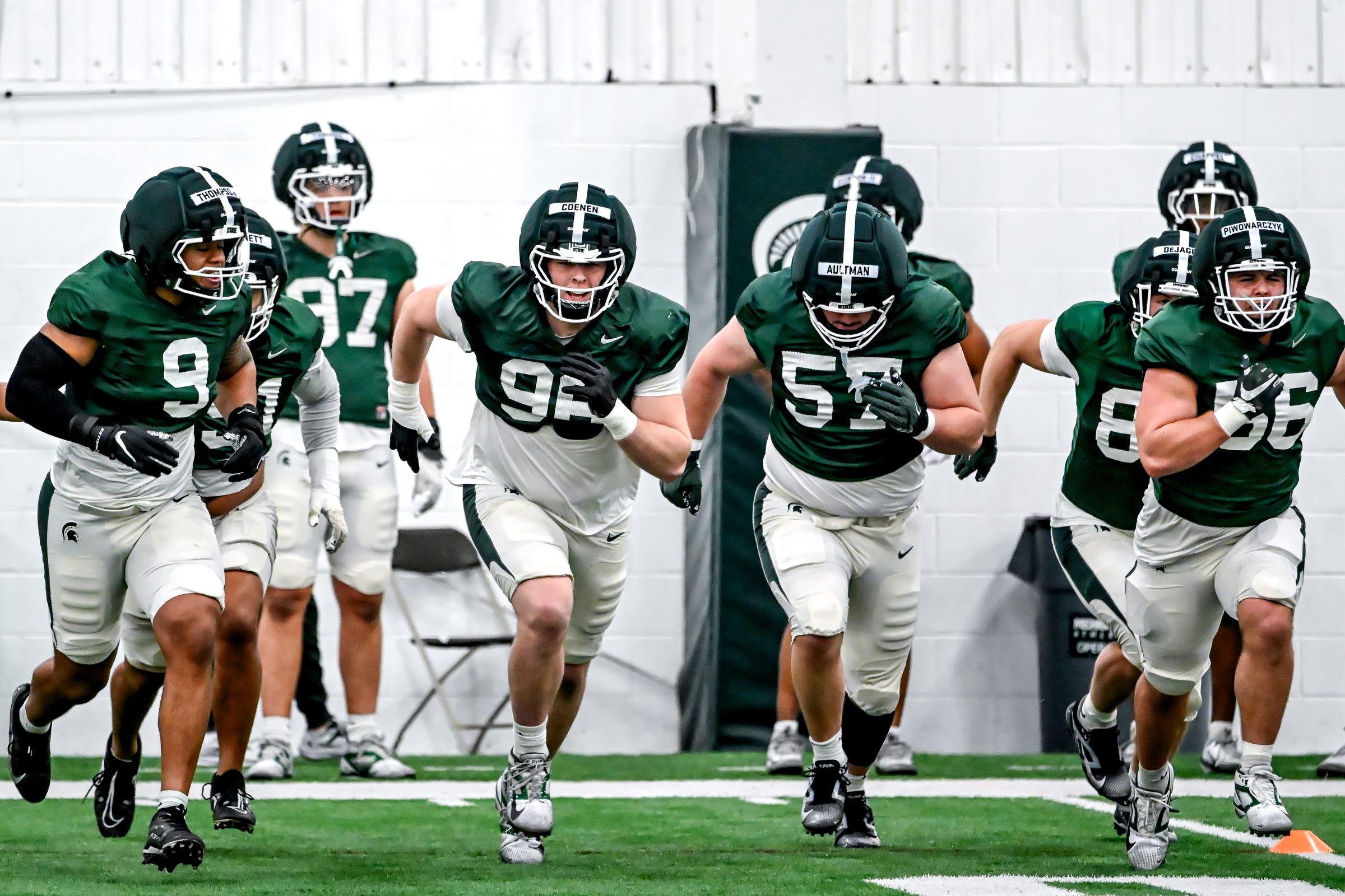 2026-03-24T162152Z_1849689306_MT1USATODAY28574393_RTRMADP_3_FROM-LEFT-MICHIGAN-STATE-S-KEAHNIST-THOMPSON-ELI-COENEN.JPG