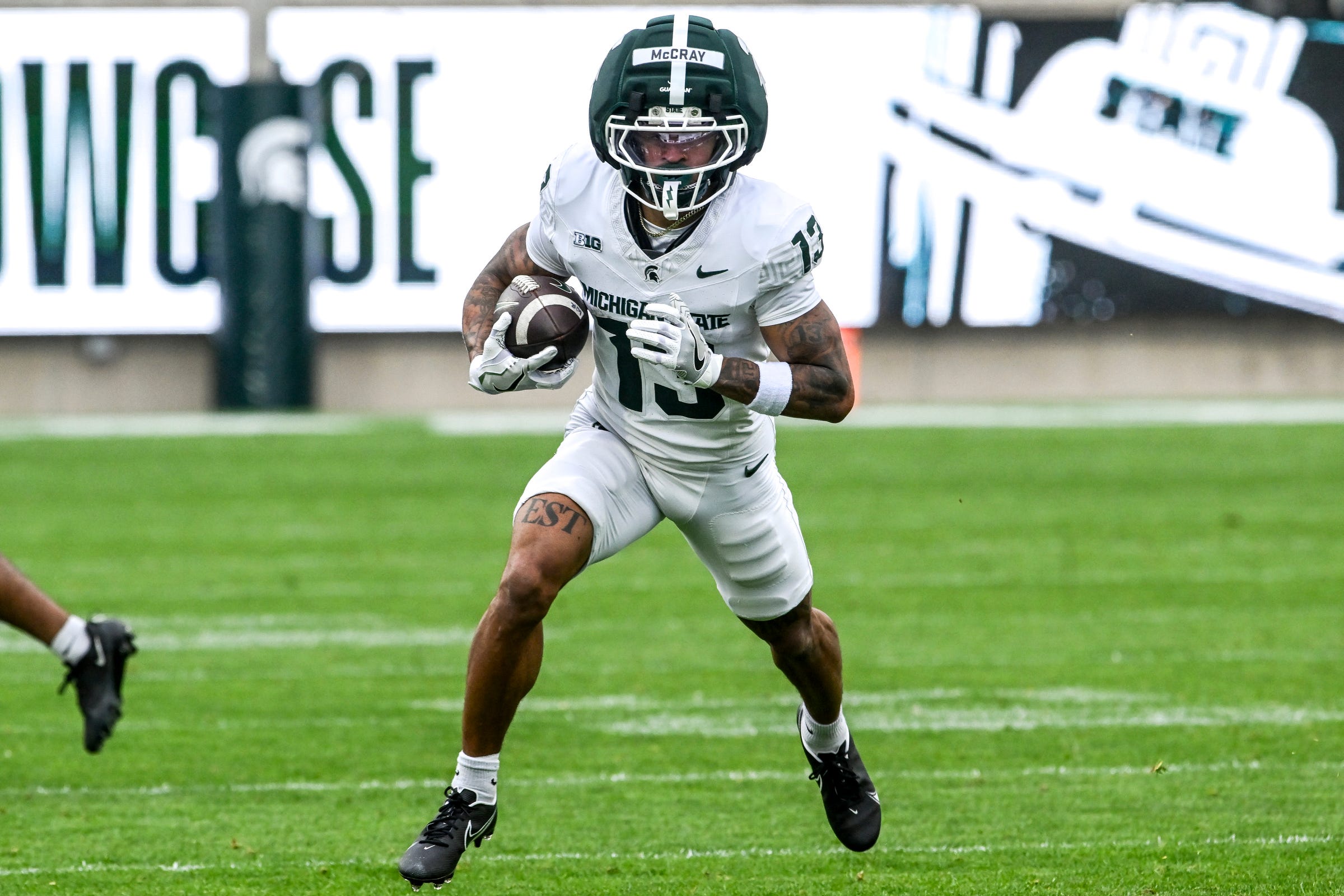 2026-04-18T201409Z_1903187959_MT1USATODAY28759784_RTRMADP_3_MICHIGAN-STATE-S-CHRISHON-MCCRAY-RUNS-AFTER-A-CATCH-DURING.JPG